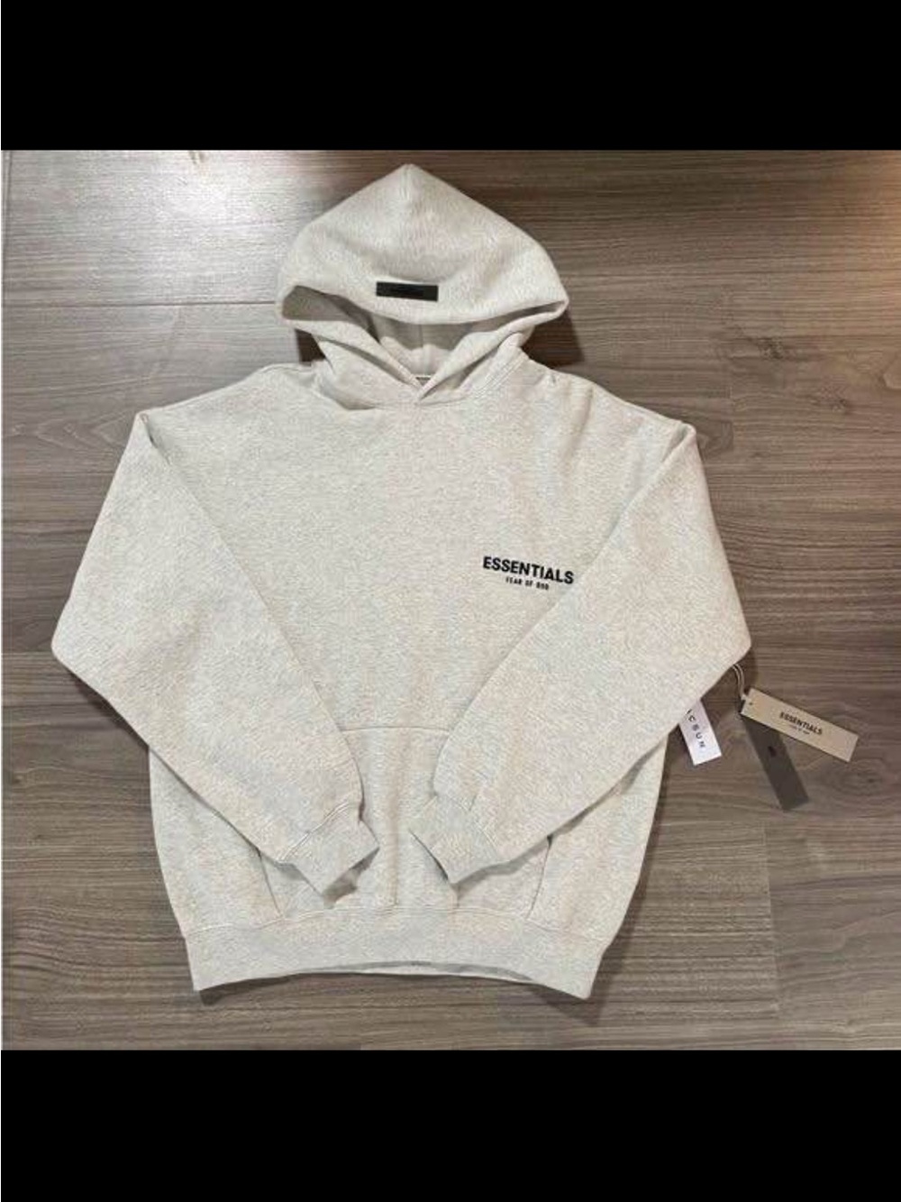 Fear of God Essentials Hoodie in Light Gray includes dust bag
